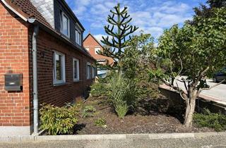 Doppelhaushälfte kaufen in 23617 Stockelsdorf, Gemütliche Doppelhaushälfte auf großem Grundstück mit viel Potenzial