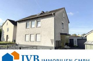 Haus kaufen in 33829 Borgholzhausen, Zweifamilienhaus mit Garage in ruhiger Lage von Borgholzhausen!