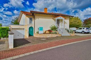 Einfamilienhaus kaufen in 35321 Laubach, Exklusives Einfamilienhaus mit Wellness-Flair in Feldrandlage