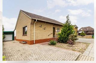 Haus kaufen in 26817 Rhauderfehn, Bungalow mit Potenzial - in ruhiger und zentrumsnaher Lage mit Blick ins Grüne !