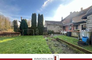 Haus kaufen in 52531 Übach-Palenberg, Großzügiges Wohnhaus mit zwei Anbauten und weitläufigem Grundstück