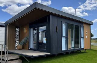 Anlageobjekt in 71229 Leonberg, Kleines Architekturhaus mit Garten im Schwarzwald nähe der Enz