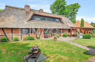 Haus kaufen in 21444 Vierhöfen, Großzügiges Doppelhaus mit Reetdach in guter Lage von Vierhöfen