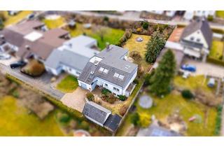 Einfamilienhaus kaufen in 90556 Cadolzburg, HEGERICH: Von Gartentraum & jede menge Platz - komfortabel ausgebautes Einfamilienhaus in Cadolzburg