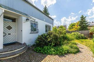 Einfamilienhaus kaufen in 90556 Cadolzburg, HEGERICH: Von Gartentraum & jede menge Platz - komfortabel ausgebautes Einfamilienhaus in Cadolzburg