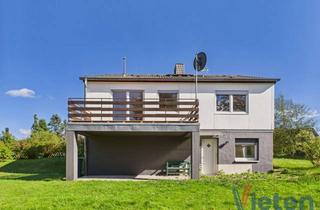Haus kaufen in 53940 Hellenthal, Charmanter Bungalow mit ausgebautem Souterrain in Hellenthal-Hollerath
