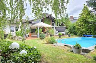 Haus kaufen in 96253 Untersiemau, Zuhause ist, wo man glücklich ist – attraktiver Bungalow mit traumhafter Außenanlage