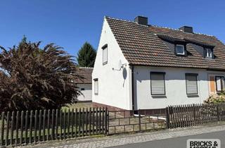 Doppelhaushälfte kaufen in 06766 Bitterfeld-Wolfen, „Gestalten statt nur wohnen – renovierungsbedürftige Doppelhaushälfte in Wolfen-Süd“