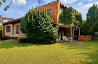 Einfamilienhaus kaufen in 64846 Groß-Zimmern, Einfamilienhaus im Bauhaus-Stil in Groß-Zimmern – großzügiges Grundstück, solide Substanz