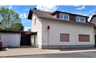 Haus kaufen in 61209 Echzell, Echzell - Wohnen und Arbeiten im Einklang. Wohn- und Geschäftshaus mit einer 3 Zimmer Wohnung, Büroetage und Garage!