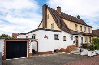 Doppelhaushälfte kaufen in 36179 Bebra, Bebra - Vermietete Doppelhaushälfte mit Einliegerwohnung in Bebra