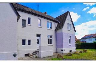 Wohnung kaufen in 45968 Gladbeck, Gladbeck - Charmante Wohnung mit Reihenhaus-Charakter, Garten und Stellplatz