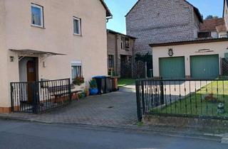 Haus kaufen in 35625 Hüttenberg, Hüttenberg - Hausverkauf mit großem Potential in Solms Niederbiel