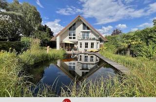 Einfamilienhaus kaufen in 28816 Stuhr, Stuhr - Uneinsehbares Grundstück mit eigenem Schwimmteich - Traumhaus!