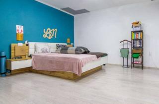 Wohnung kaufen in 79669 Zell im Wiesental, Charmante Wohnung mit ca. 88 Quadratmetern Wohnfläche und gemütlicher Laube