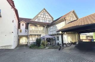 Wohnung kaufen in 74348 Lauffen, Vermietete, charmante 2-Zimmer-Erdgeschosswohnung in denkmalgeschütztem Gebäude in Lauffen am Neckar