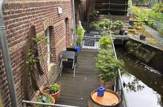 Wohnung kaufen in Mahlgasse 1b, 53721 Siegburg, Charmantes Appartement mit Terrasse in Siegburg in historischer alten Stadtmühle