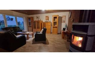 Haus kaufen in 26446 Friedeburg, Immobilie mit mehreren Wohnbereichen in Friedeburg - Neues Carport und neue Heizung