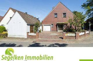 Haus kaufen in 28816 Stuhr, Ein- bis Zweifamilienhaus mit zwei Garagen, Carport und großem Garten