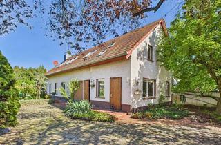 Haus kaufen in 63486 Bruchköbel, Charme trifft Charakter: Stilvoll umgebaute Scheune mit großem Garten in Bruchköbel