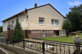 Haus kaufen in 55234 Ober-Flörsheim, Großzügiger Bungalow in ruhiger Ortsrandlage!