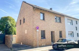 Einfamilienhaus kaufen in 50226 Frechen, Großzügiges Einfamilienhaus mit 5 Zimmern, Garten, Wintergarten und Garage in Frechen-Königsdorf