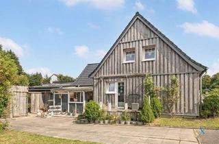 Doppelhaushälfte kaufen in 24837 Schleswig, Charmante Doppelhaushälfte mit einem schönen Garten in Schleswig