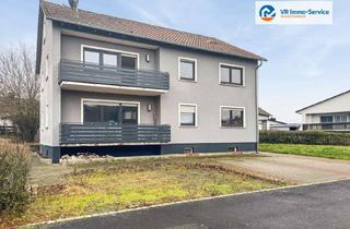 Haus kaufen in 97355 Wiesenbronn, Zweifamilienhaus mit Einliegerwohnung, Garagen und Stellplätzen