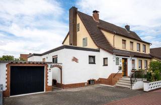 Doppelhaushälfte kaufen in 36179 Bebra, Vermietete Doppelhaushälfte mit Einliegerwohnung in Bebra