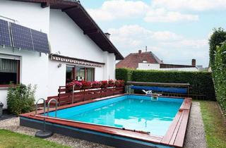 Haus kaufen in 55595 Sponheim, Familienidylle in Sponheim – Bungalow mit Garten, Pool und Einliegerwohnung