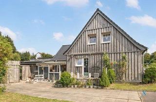 Doppelhaushälfte kaufen in 24837 Schleswig, Charmante Doppelhaushälfte mit einem schönen Garten in Schleswig