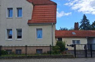 Doppelhaushälfte kaufen in 65462 Ginsheim-Gustavsburg, Gepflegtes Haus im Stil einer Doppelhaushälfte in Gustavsburg zum Verkauf