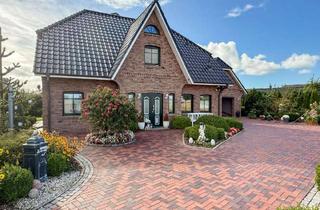 Einfamilienhaus kaufen in 25704 Epenwöhrden, Typisch friesisch, top-gepflegt, viel Platz: modernes Einfamilienhaus in der Nähe von Heide.