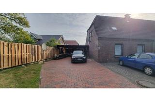 Doppelhaushälfte kaufen in 26345 Bockhorn, Stilvolle Doppelhaushälfte mit ca. 130 m² Wohn- und Nutzfläche, Carport, Garten und neuer Heizung