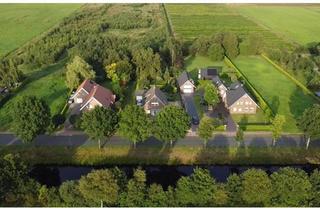 Haus kaufen in 26639 Wiesmoor, Wiesmoor - Großes Haus mit 178 m², am Kanal mit Wintergarten, schöner Garten