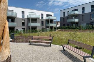 Wohnung kaufen in 83549 Eiselfing, Holz trifft Beton - Nachhaltige 3-Zimmer-EG-Wohnung - modern & barrierearm mit Garten