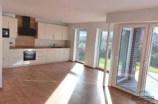 Wohnung kaufen in 26441 Jever, Exklusive Erdgeschoss-Terrassenwohnung mit Garten in Top-Lage – Jever Innenstadt