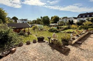 Haus kaufen in 56743 Mendig, Wohnhaus mit zwei separaten Wohnungen: Zentrale Lage, Garten, Terrasse & Balkon