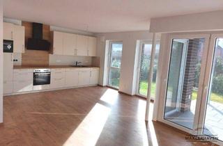 Wohnung kaufen in 26441 Jever, Exklusive Erdgeschoss-Terrassenwohnung mit Garten in Top-Lage – Jever Innenstadt