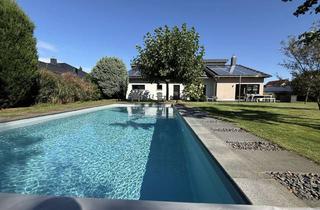 Einfamilienhaus kaufen in 04509 Delitzsch, Freistehendes Einfamilienhaus im Bungalowstil mit Traumgarten und bester Ausstattung in Delitzsch