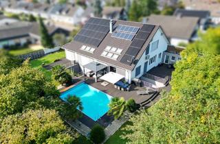 Villa kaufen in 66740 Saarlouis, Premium-Villa mit architektonischer RaffinesseEinliegerwohnung und Pool in begehrter Lage