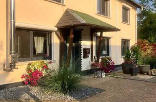 Einfamilienhaus kaufen in 57632 Flammersfeld, Flammersfeld - Einfamilienhaus mit großem Grundstück incl. separatem Bauland