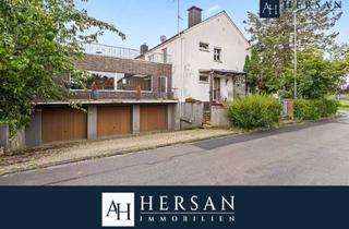 Haus kaufen in 52428 Jülich, Haus mit Seltenheitswert: Dachterrasse, 3 Garagen & viel Potenzial in Jülich!
