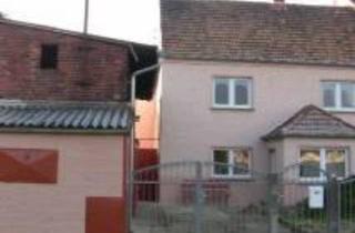 Einfamilienhaus kaufen in 04886 Beilrode, Beilrode - Doppelhaushälfte mit Gestaltungspotenzial in Großtreben