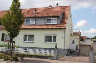 Doppelhaushälfte kaufen in 55450 Langenlonsheim, Langenlonsheim - Doppelhaushälfte mit 4 Zi, Terrasse, Keller und Garage