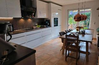 Wohnung kaufen in 56220 Urmitz, Urmitz - Erdgeschosswohnung mit Südgarten in ruhiger Lage
