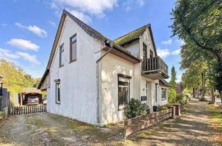 Haus kaufen in 27721 Ritterhude, Ritterhude - Charmantes Zweifamilienhaus mit Einliegerwohnung, großem Garten und Pool