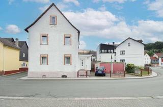 Anlageobjekt in 35606 Solms, Charmantes Fachwerkhaus in Solms-Oberndorf mit Hof, Balkon, Garagen und viel Potenzial