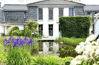 Villa kaufen in 30966 Hemmingen, Traumhafte Villa am kleinen See – repräsentativ wohnen in Hemmingen-Westerfeld!