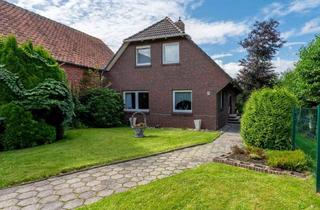Haus kaufen in 26759 Hinte, Gepflegtes Haus mit fünf Zimmern in Hinte am Wasser zuzüglich Nebengebäude